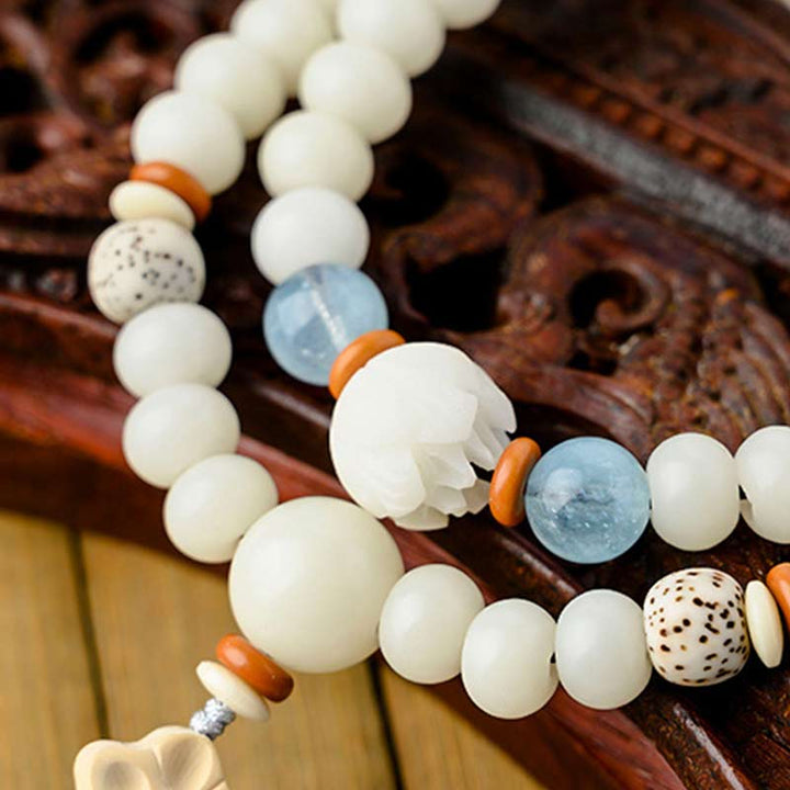 Pulsera de bendición de loto Bodhi de jade blanco tibetano con Buddha Stones