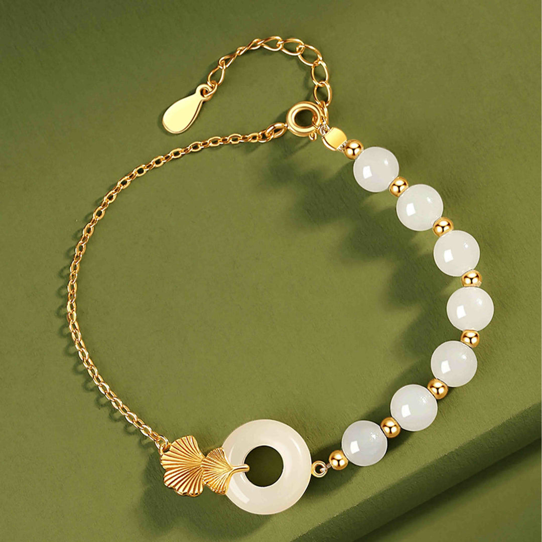 Pulsera de la suerte de hoja de ginkgo con hebilla de paz de jade blanco hetiano de plata de ley 925 con Buddha Stones