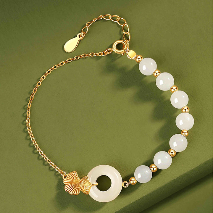 Pulsera de la suerte de hoja de ginkgo con hebilla de paz de jade blanco hetiano de plata de ley 925 con Buddha Stones