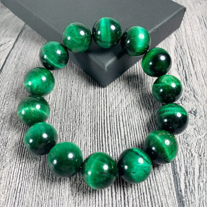 Pulsera de fuerza de ojo de tigre verde natural con Buddha Stones