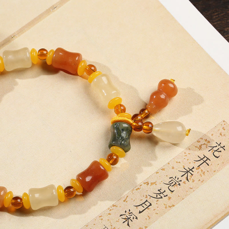 Pulsera con dijes de riqueza de calabaza de jade de seda dorada natural