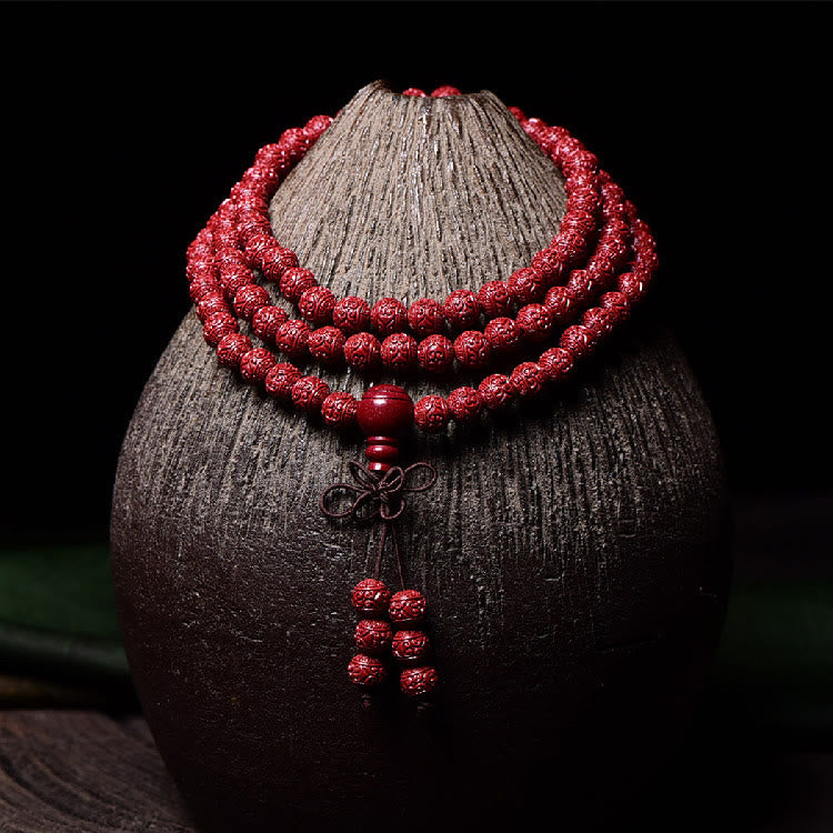 Buddha Stones 108 cuentas Mala cinabrio Om Mani Padme Hum patrón grabado pulsera de bendición - Cuentas redondas grabadas de 6 mm*108 - image 0