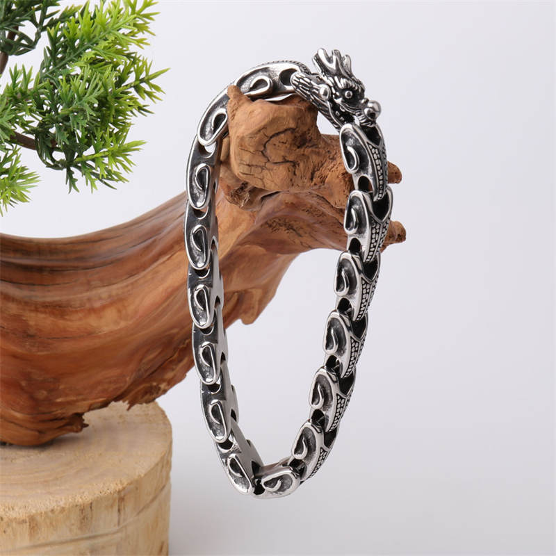 Brazalete de pulsera de la suerte de acero y titanio con dragón