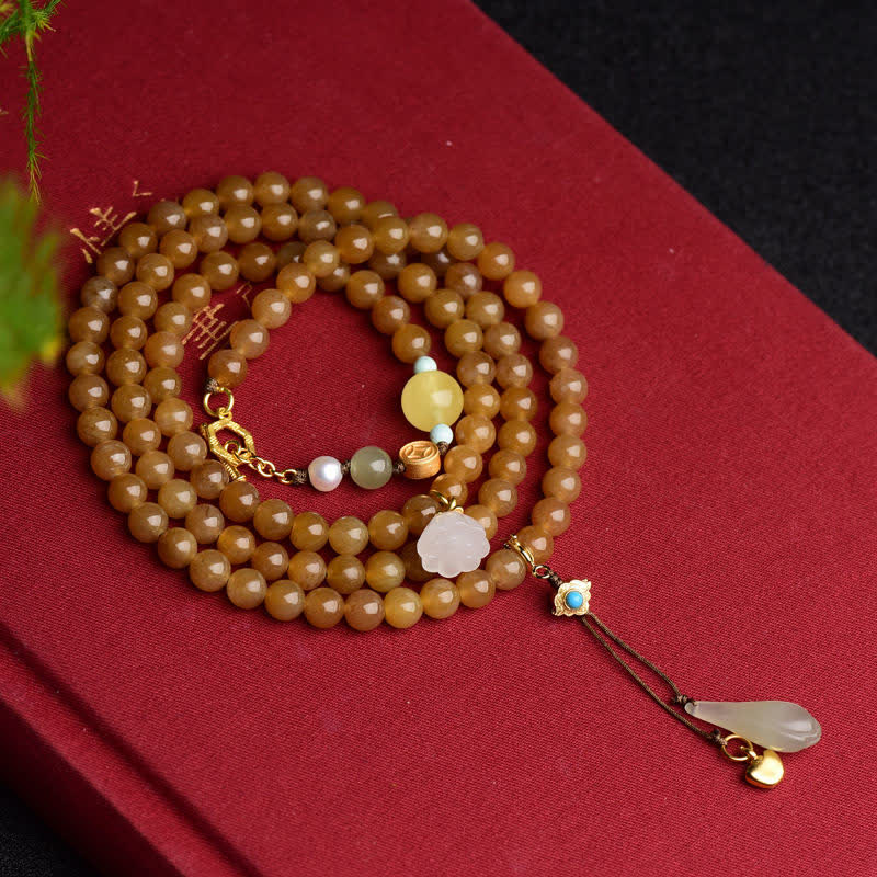 Pulsera de éxito de perlas de jade blanco de loto ámbar de topacio hetiano natural