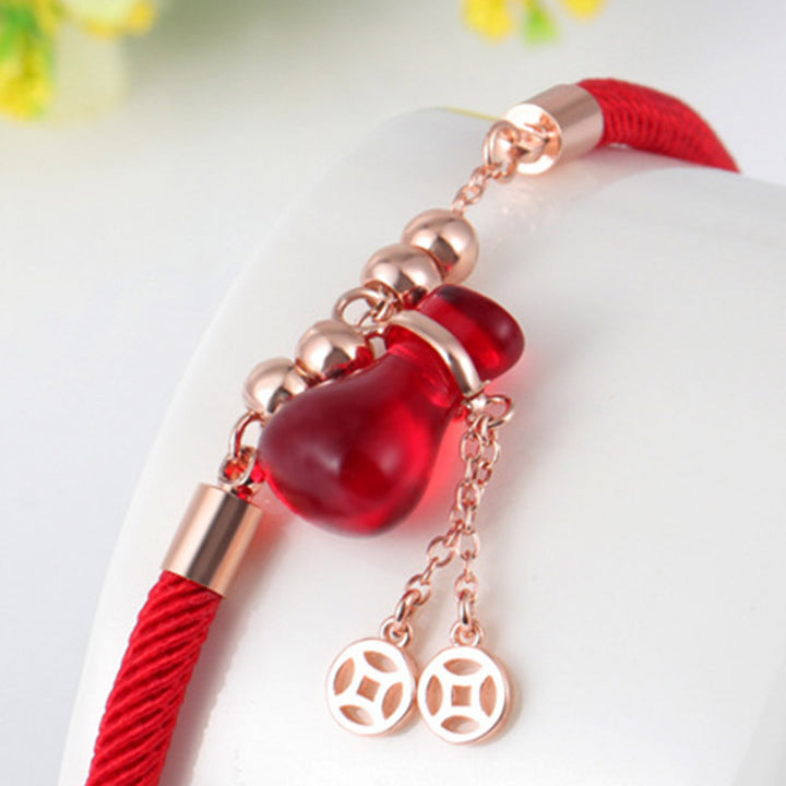 Pulsera de cuerda roja con ágata roja y atractor de riqueza de Buddha Stones