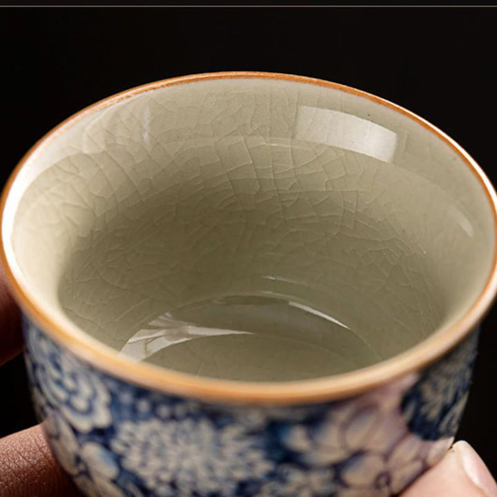 Tazas de té de cerámica de crisantemo con flor de ciruelo y peonía de loto Vintage con Buddha Stones