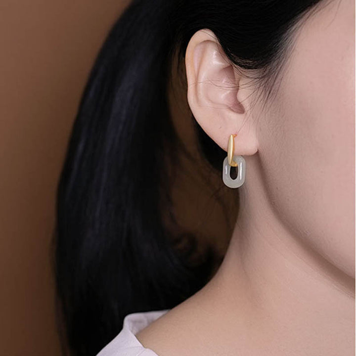 Pendientes de bendición de la felicidad de jade blanco redondo de plata de ley 925 con Buddha Stones
