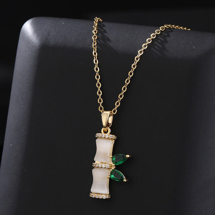 Colgante de collar de armonía con diamantes de imitación de bambú de calcedonia chapado en oro de 18 quilates con Buddha Stones