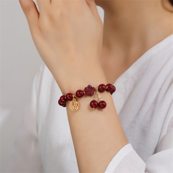 Pulsera de bendición de flor de cerezo con personaje de cinabrio Fu de Buddha Stones
