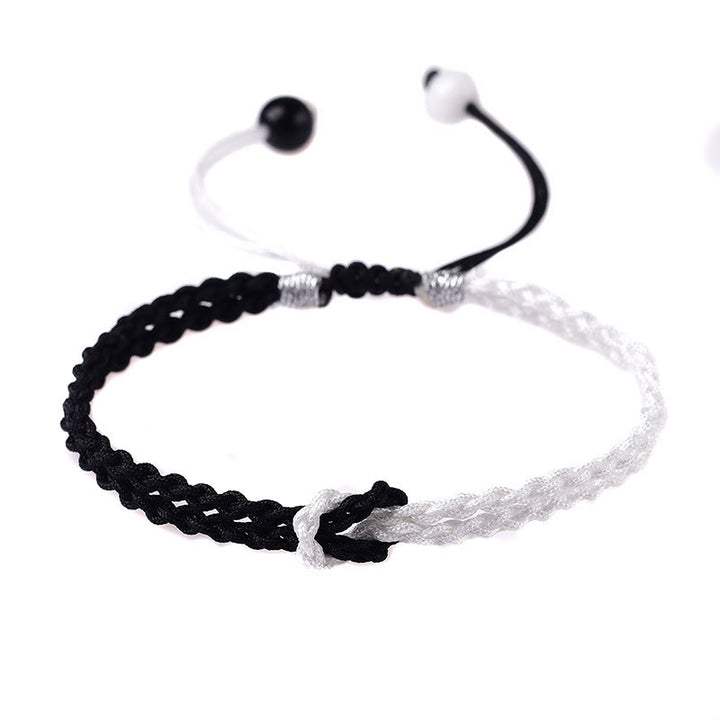 Pulsera curativa trenzada de cuerda blanca y negra hecha a mano con Buddha Stones