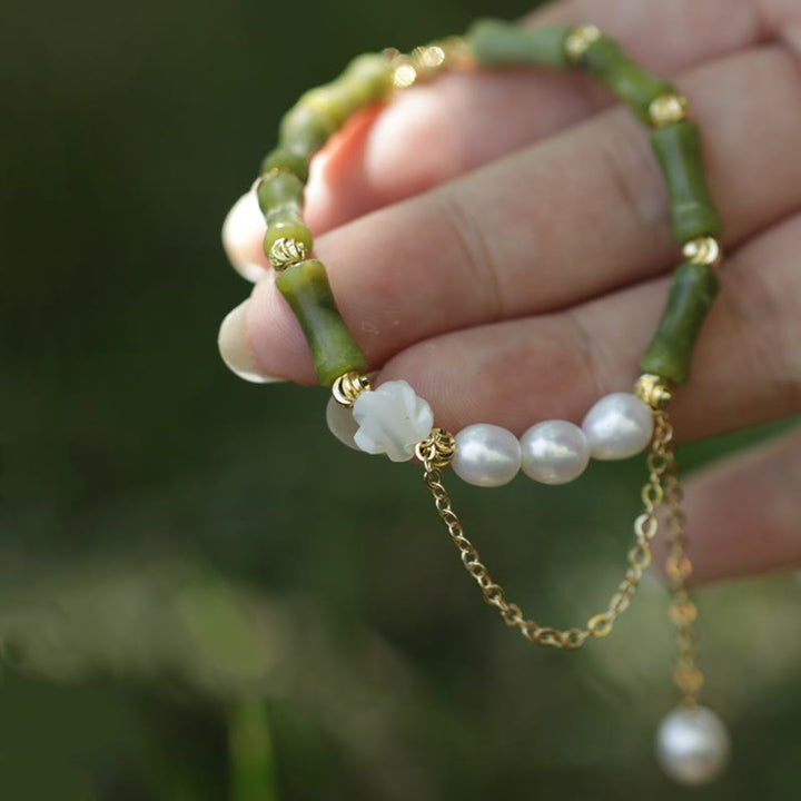 Pulsera de riqueza con Buddha Stones, bambú verde, jade, lirio de los valles