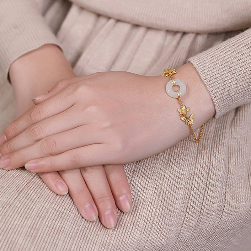 Pulsera de prosperidad de pez koi de jade blanco con Buddha Stones