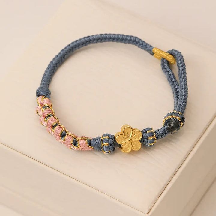 Pulsera de hilo de riqueza con diseño de flor de durazno