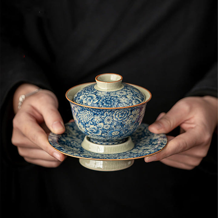 Buddha Stones azul y blanca vintage Flor de durazno Loto Peonía Cerámica Gaiwan Sancai Taza de té Kung Fu Taza de té y platillo con tapa