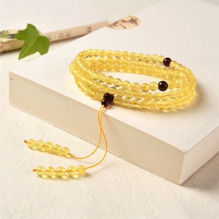 Pulsera de ansiedad transparente con Buddha Stones , 108 cuentas de Mala, ámbar Natural
