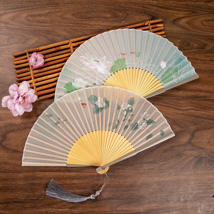 Abanico plegable de bambú de mano con flores de loto jazmín y Buddha Stones