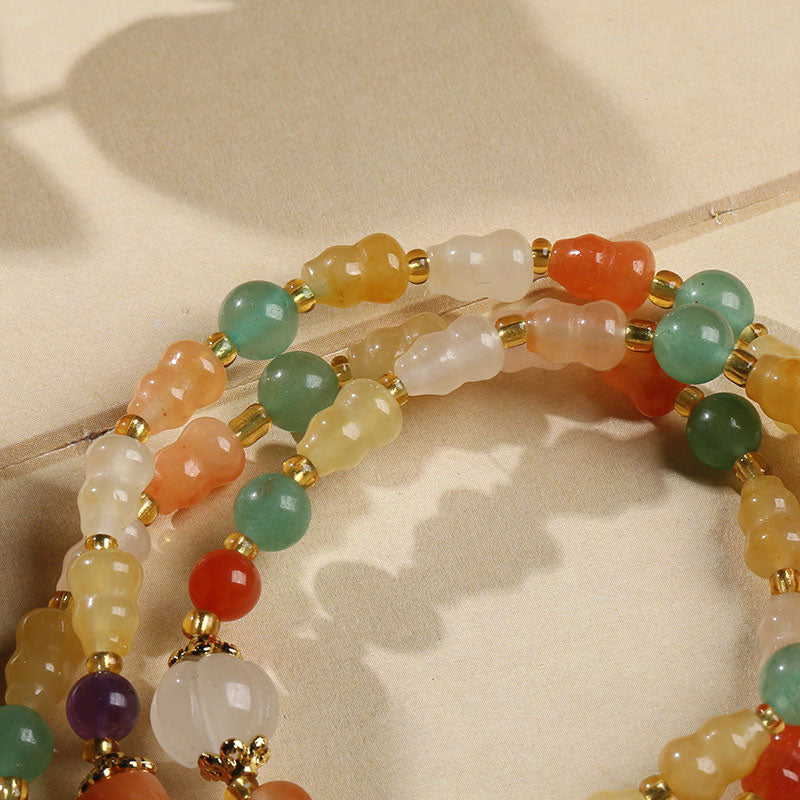 Pulsera de riqueza de calabaza de jade de seda dorada con Buddha Stones