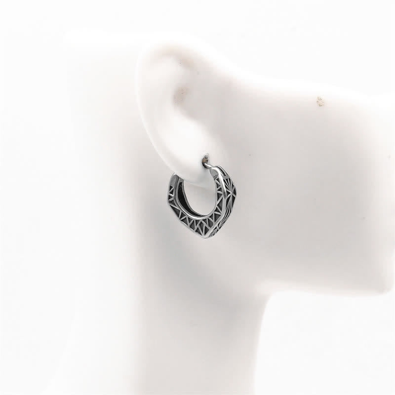 Pendientes de equilibrio de acero y titanio con aro vikingo