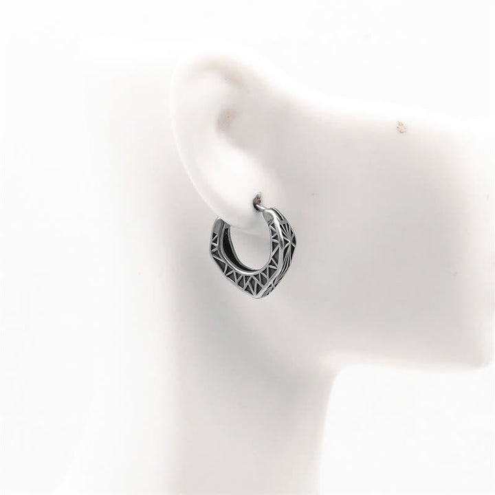 Pendientes de equilibrio de acero y titanio con aro vikingo