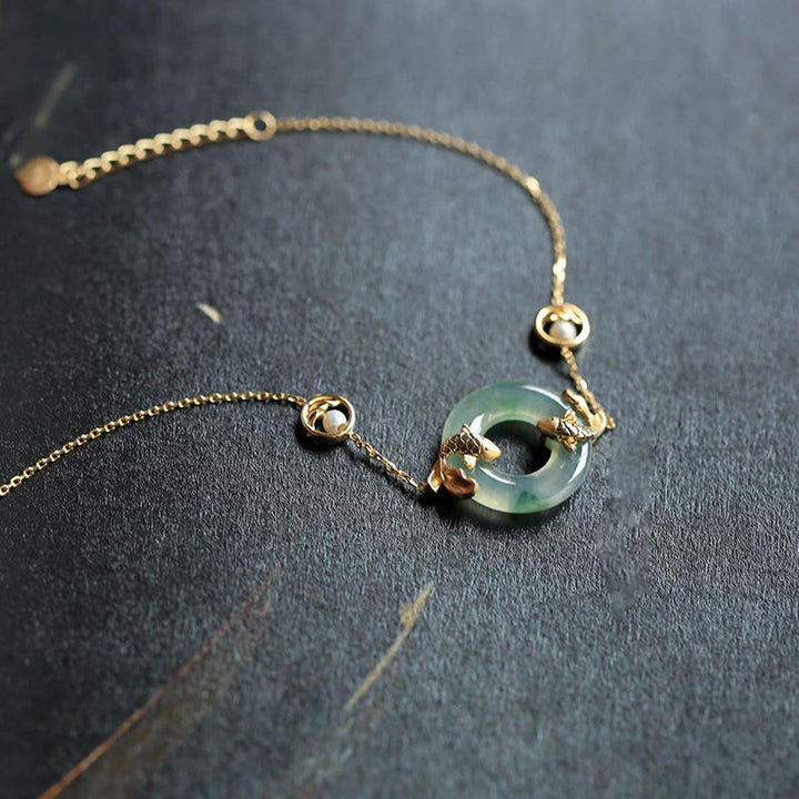 Pulsera de armonía curativa con peces Koi de jade cian y Buddha Stones