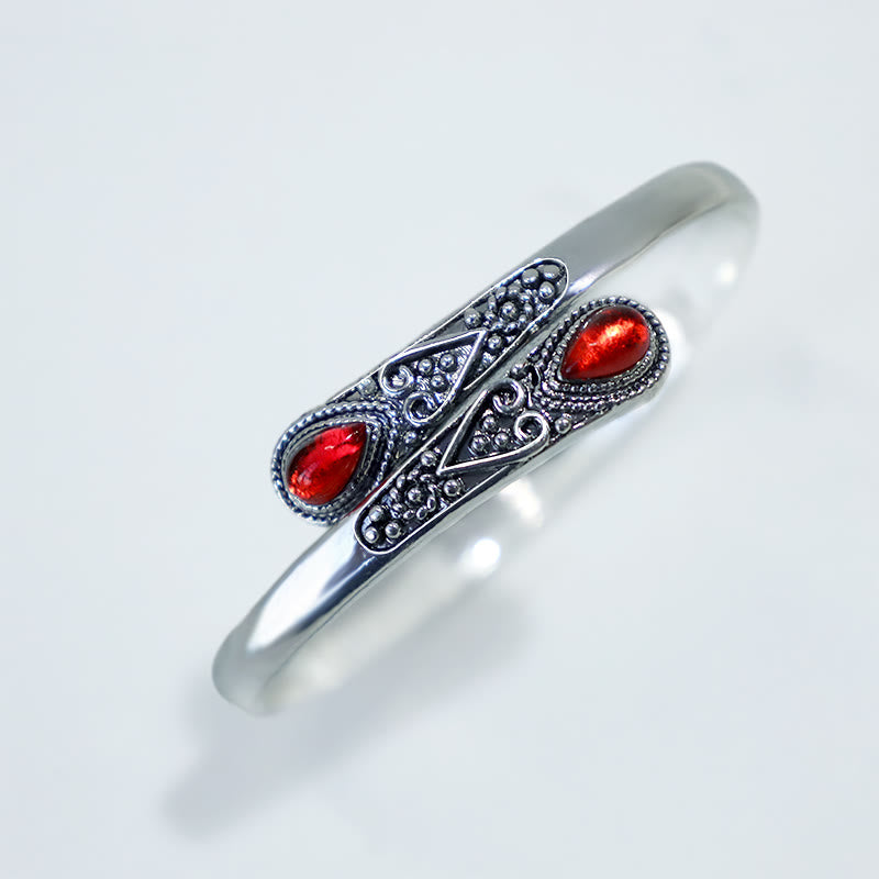 Brazalete de pulsera curativo con patrón de gota de agua de circonita con Buddha Stones