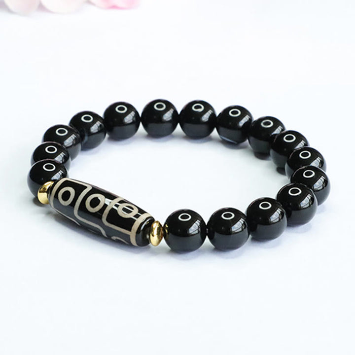 Pulsera de poder de ónix negro con cuentas Dzi tibetanas de nueve ojos de Buddha Stones