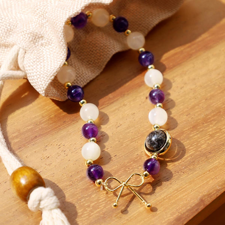 Pulsera de cuentas espirituales de cuarzo rutilado negro con ojo de gato y amatista - image 3