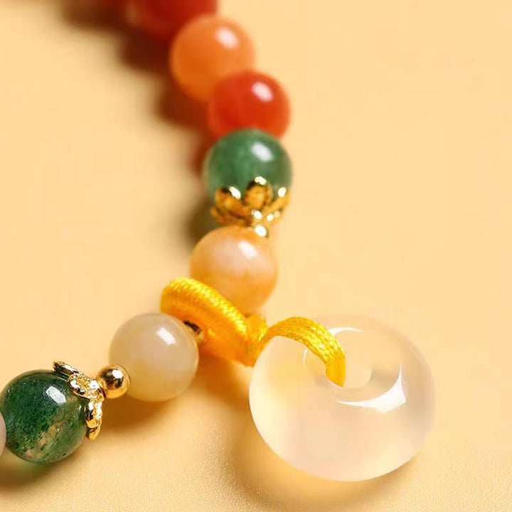 Pulsera de riqueza con hebilla de paz de jade de seda dorada colorida chapada en oro de 14 Buddha Stones