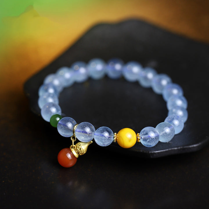 Pulsera con dije de calabaza de la paz con ágata roja y aguamarina