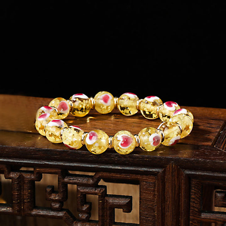 Pulsera de cuentas de cristal Liuli fluorescente luminosa con corazón de amor rosa de la familia de las bestias que tragan oro con Buddha Stones