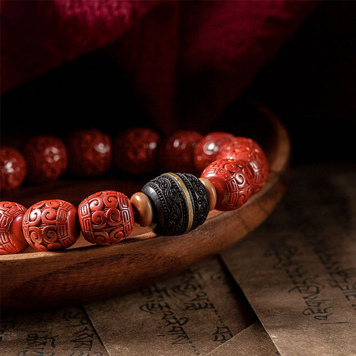 Pulsera de bendición tranquila de ébano y cinabrio natural con Buddha Stones